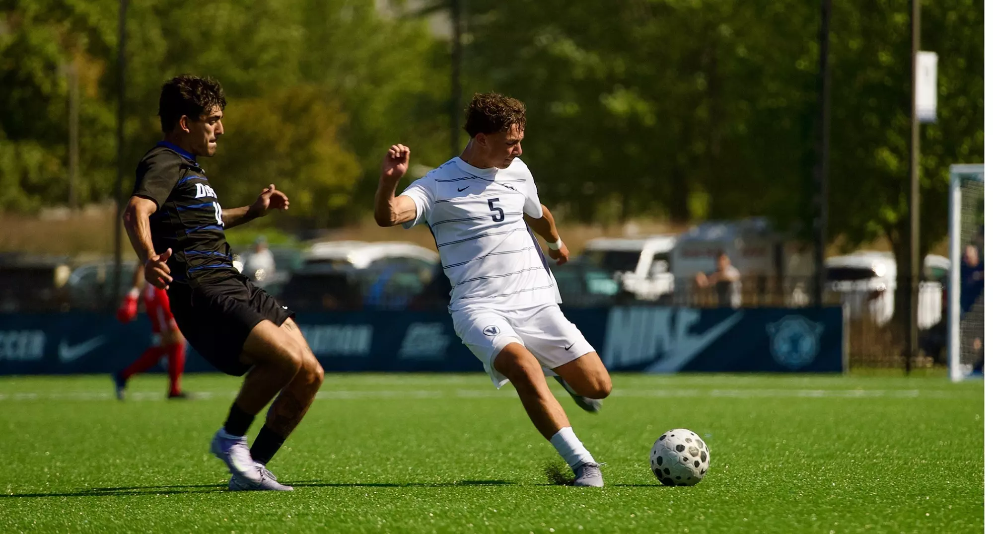 Lorenzo Avalos mentoring players — PTP camp