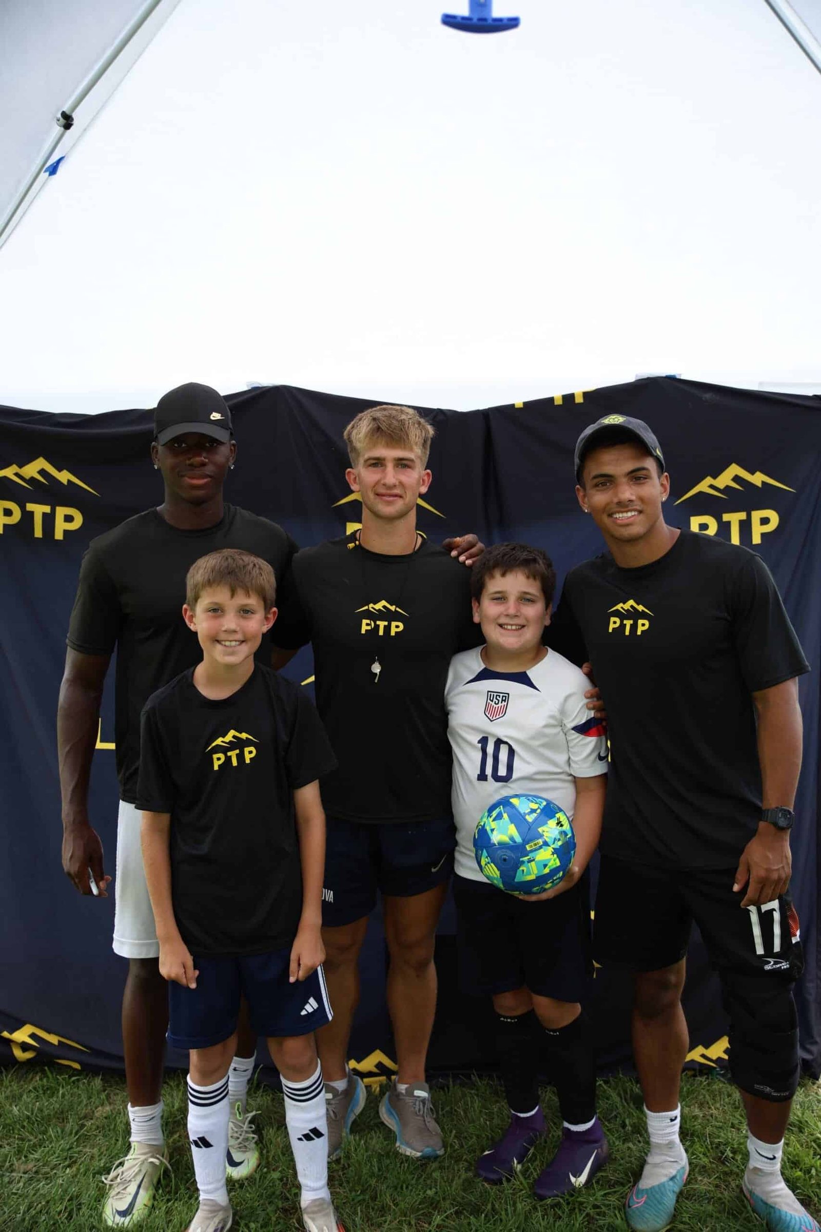 Coach Luke and Drew with campers