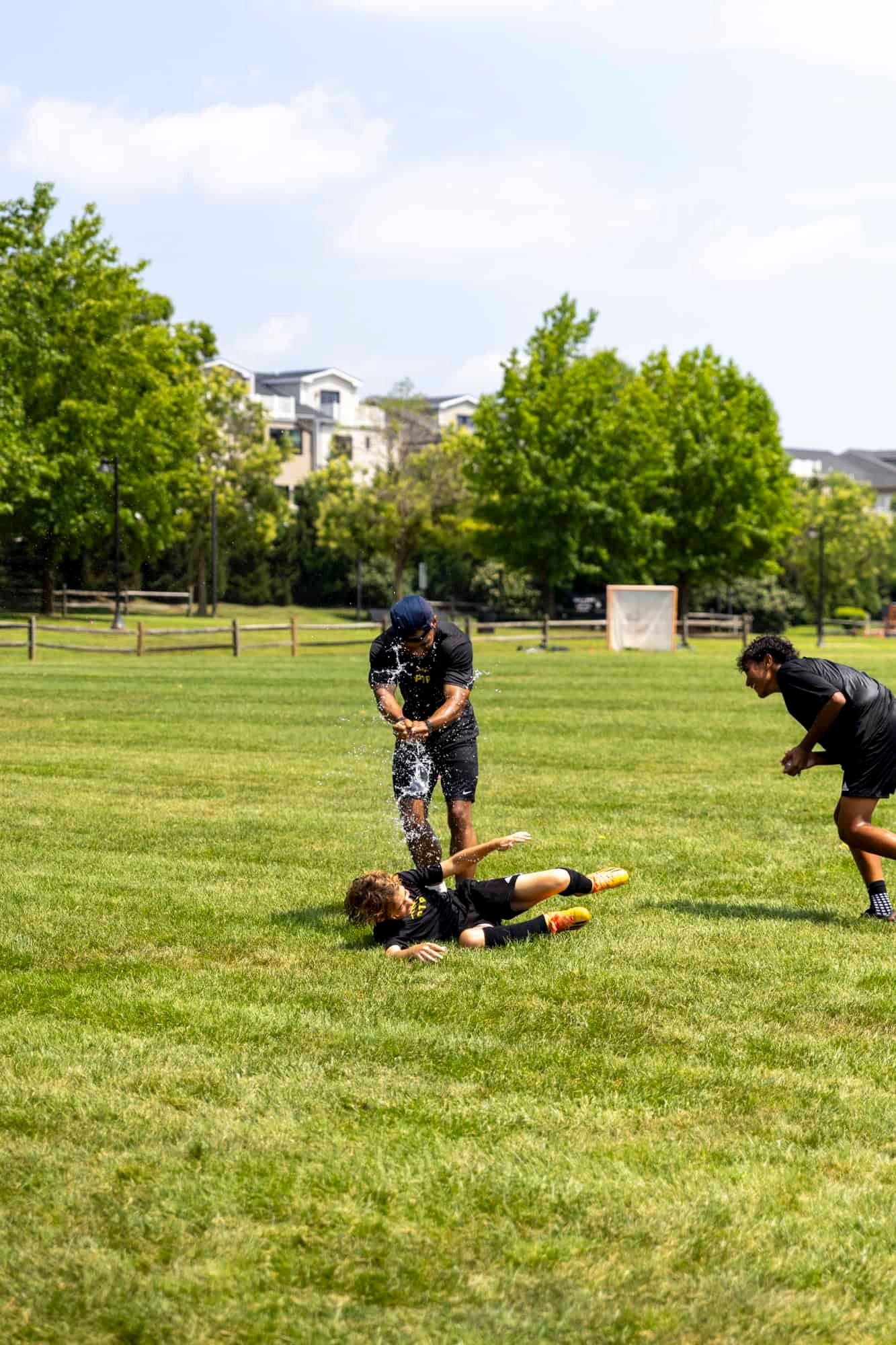 Water balloon fun during soccer camp