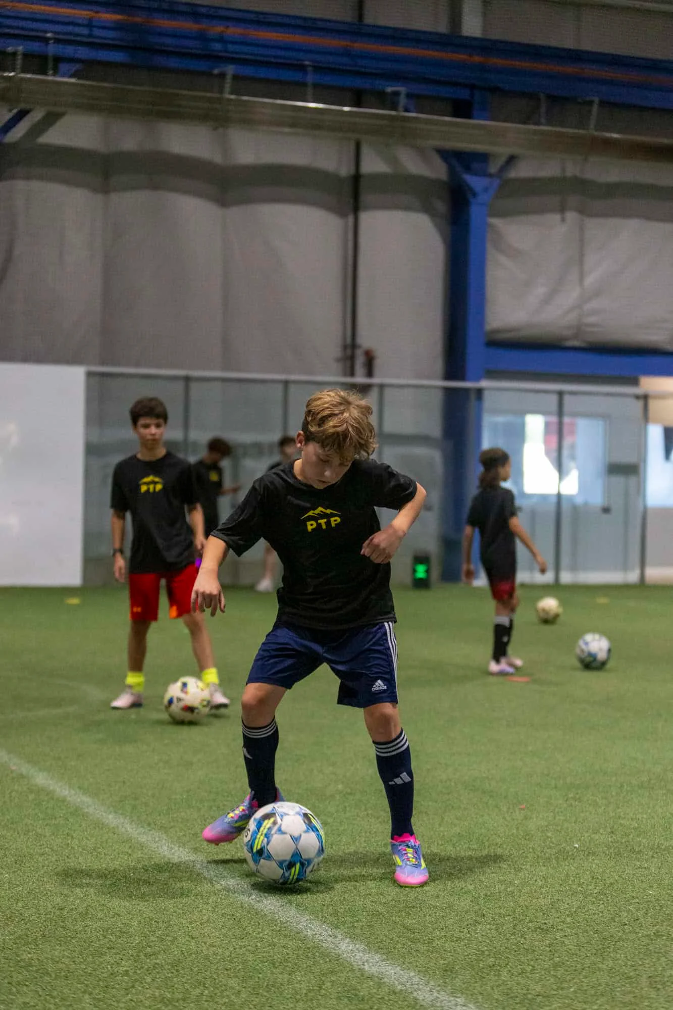 Dribbling clinic with NCAA teammates in 2022.